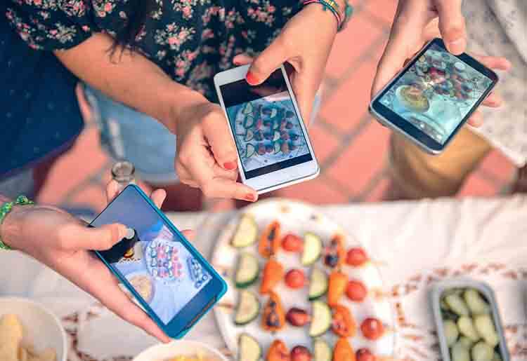 Millennials taking food photos Millennials taking food photos