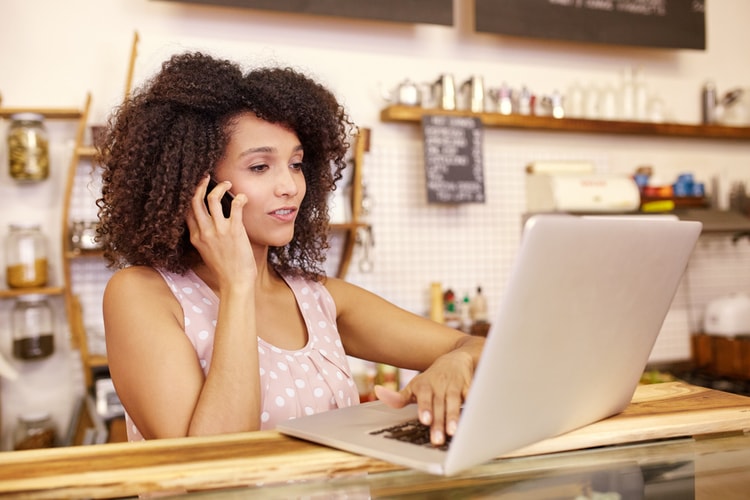 Person making a website at store Person making a website at store