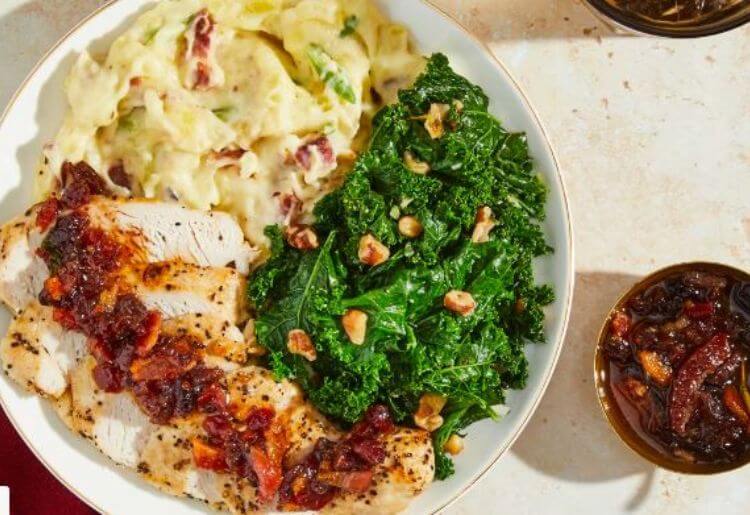 Green Chef Thanksgiving Fare - Turkey with Cranberry-Bacon Pan Sauce cheesy bacon mashed potatoes, garlicky kale, walnuts