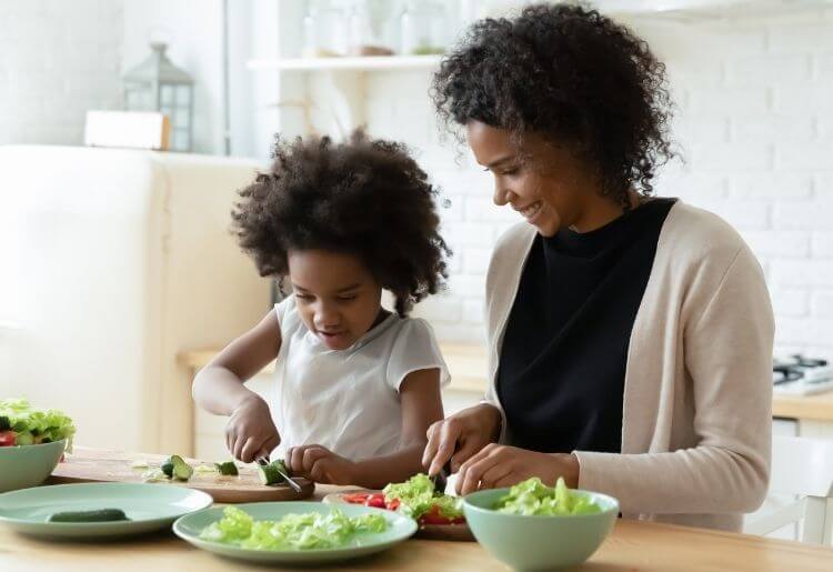 Mother and daughter cooking a meal for mother's day