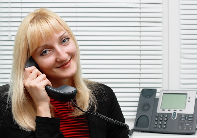 Businesswoman on VoIP phone Businesswoman on VoIP phone
