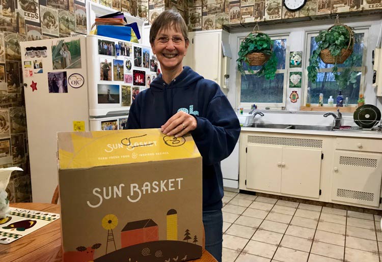 Paula Mack receiving Sun Basket box Paula Mack receiving Sun Basket box